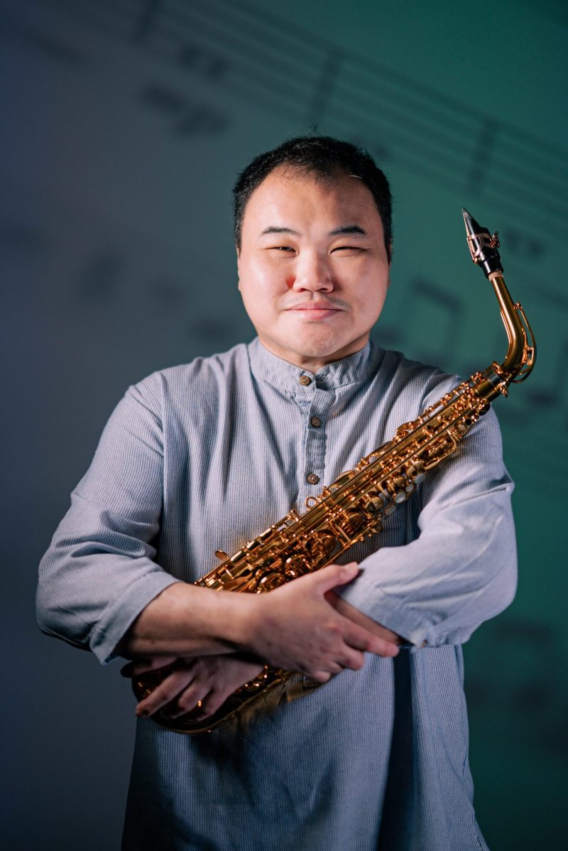 Leslie Wong  Musician with Saxophone